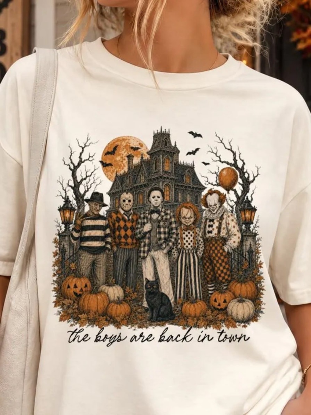 Cream Short‑Sleeve Tee with Orange and Black Halloween Graphic